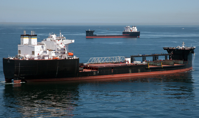 USNS Montford Point (T-ESD-1) and USNS John Glenn (T-ESD-2) pass each other near San Diego in 2014. (NASSCO photo)