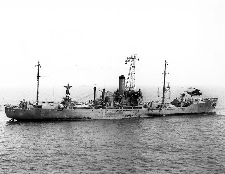 USS Liberty (AGTR-5) receives assistance from units of the Sixth Fleet, after she was attacked and seriously damaged by Israeli forces off the Sinai Peninsula on 8 June 1967. (U.S. Navy Photo/Wikimedia)