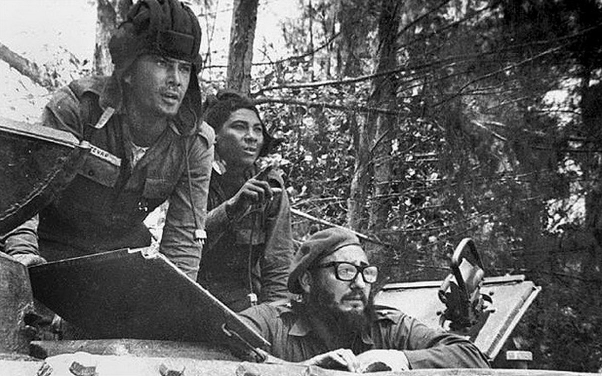 Cuban leader Fidel Castro sits inside a tank near Playa Giron, Cuba, during the Bay of Pigs invasion. (AP)