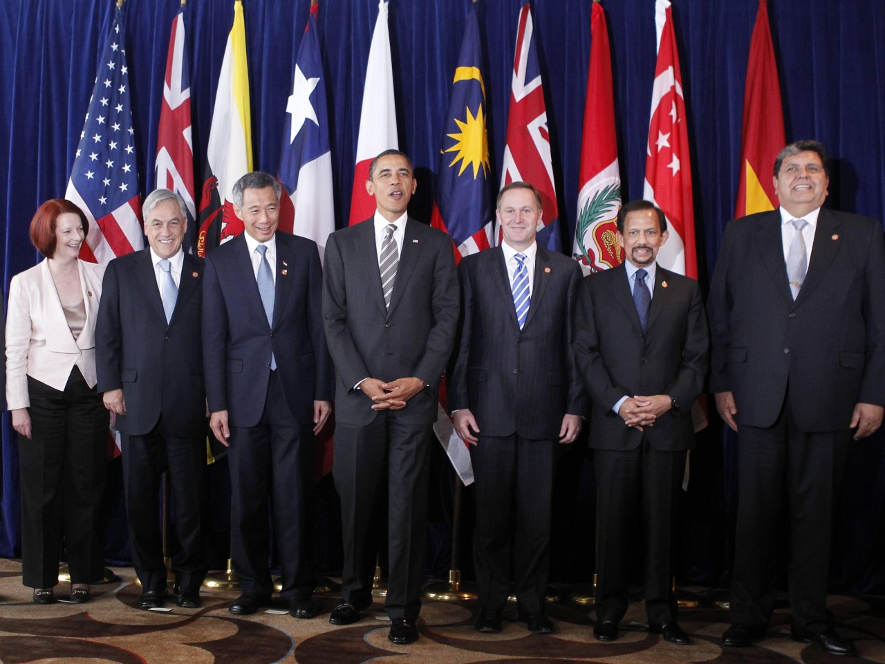 Former U.S. President Barack Obama in 2010, with (left to right) Prime Minister Naoto Kan of Japan, Vietnamese President Nguyen Minh Triet, Prime Minister Julia Gillard of Australia, Chilean President Sebastian Pinera, Prime Minister Lee Hsien Loong of Singapore, Prime Minister John Key of New Zealand, Sultan Hassanal Bolkiah of Brunei, President Alan Garcia of Peru, and Malaysian Deputy Prime Minister Muhyiddin Yassin. (AP/Charles Dharapak)