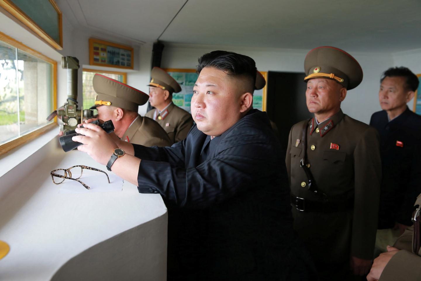 North Korean leader Kim Jong Un inspects the defense detachment on Jangjae Islet and the Hero Defense Detachment on Mu Islet located in the southernmost part of the waters off the southwest front. (KCNA/Reuters)