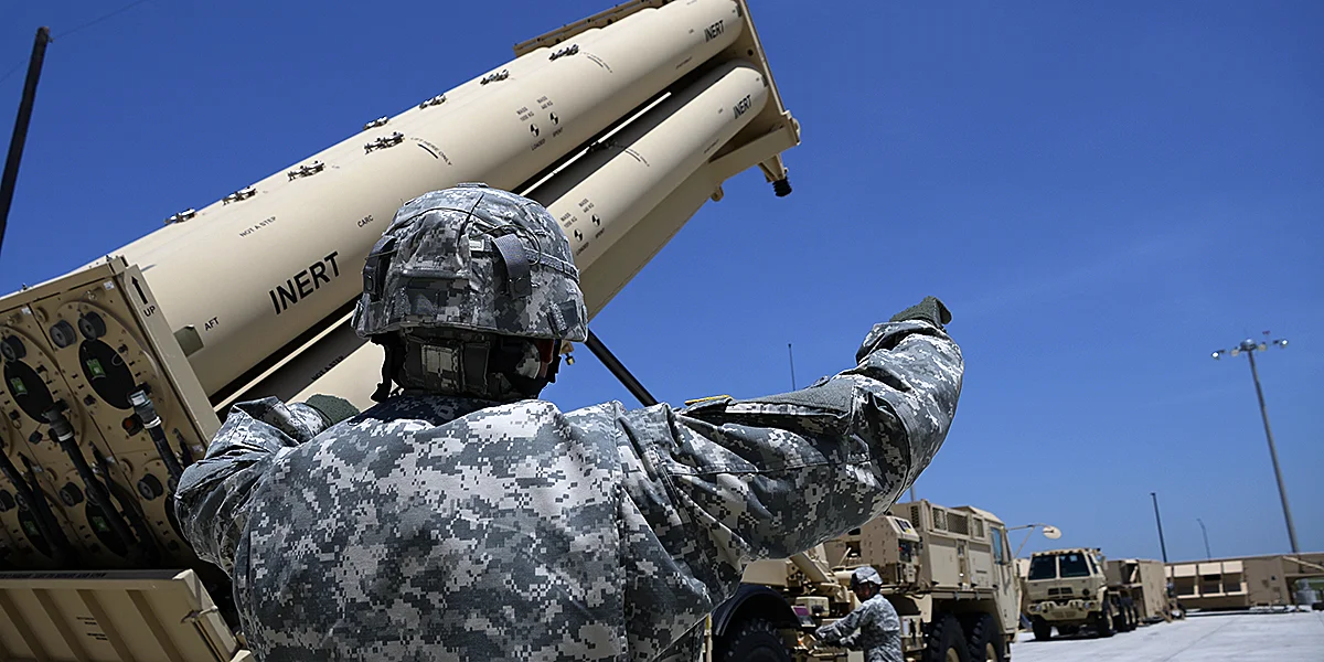 Sgt. 1st Class Benson Gatchalian raises the launcher of a THAAD unit outside the THAAD Instructional Facility as Sgt. 1st Class Penieli Vaisagote monitors | Clifford Kyle Jones