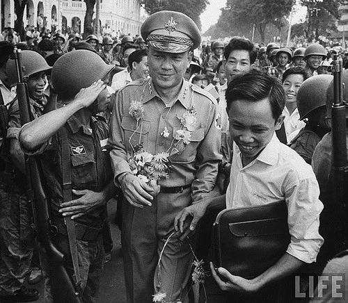 Major General Van Minh Duong, with other officers and troops celebrating the overthrow of Ngo Dinh Diem. (Getty)