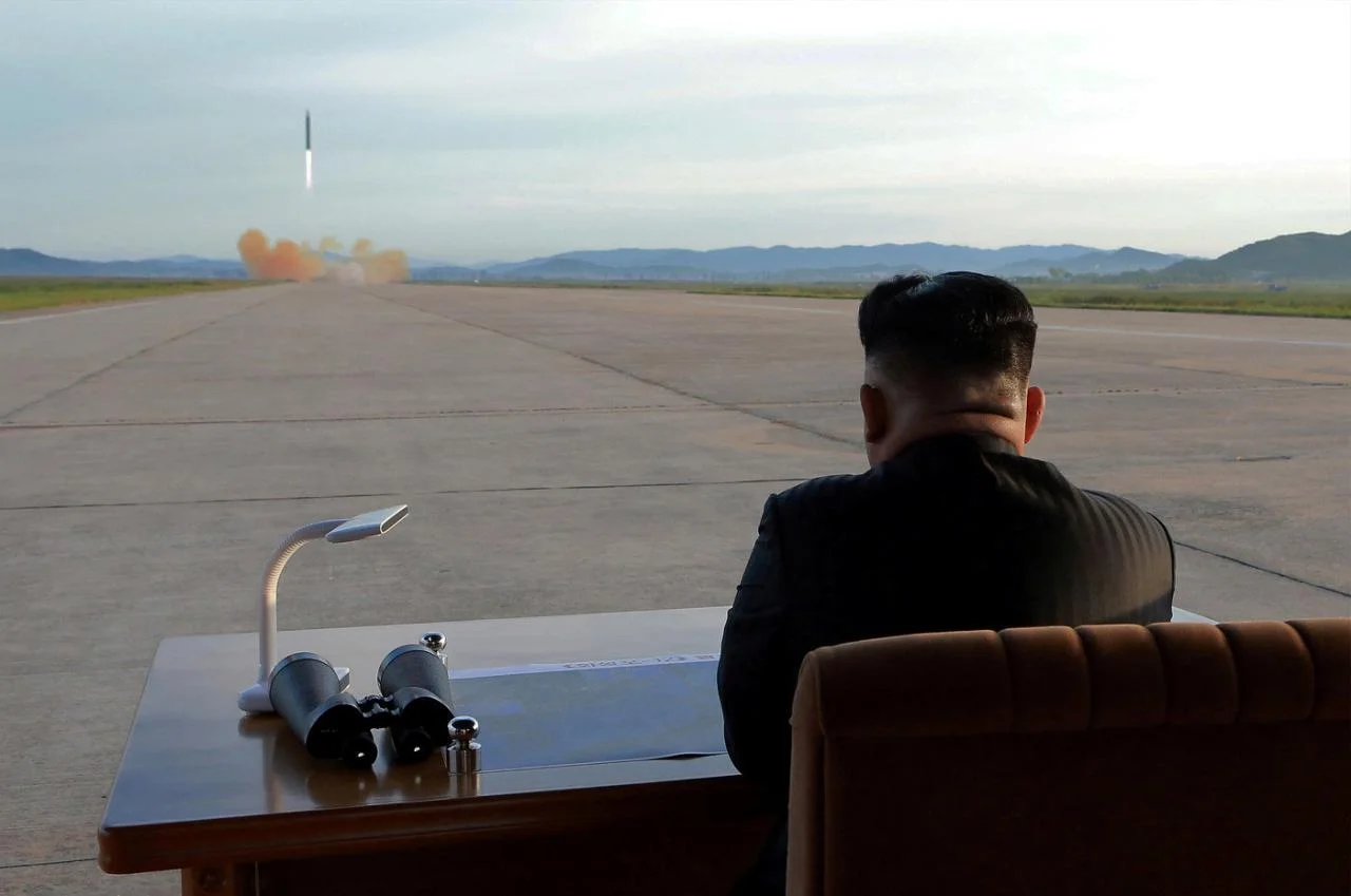North Korean leader Kim Jong Un watches the launch of a Hwasong-12 missile in this undated photo released by North Korea's Korean Central News Agency (KCNA) on September 16, 2017. (KCNA/Reuters)