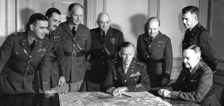 General George C. Marshall, seated at center, with members of his general staff, November 1941 | Getty Images