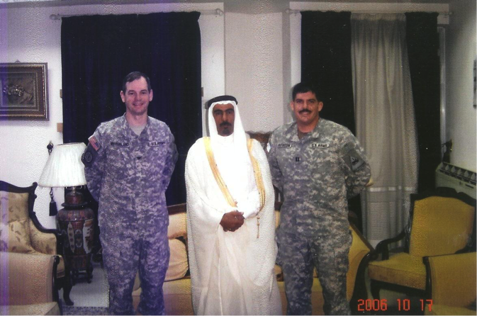 Colonel Sean MacFarland and Captain Travis Patriquin of the 1st Brigade, 1st Armored Division with Sheikh Sattar Abu Risha in Ramadi, October 2006