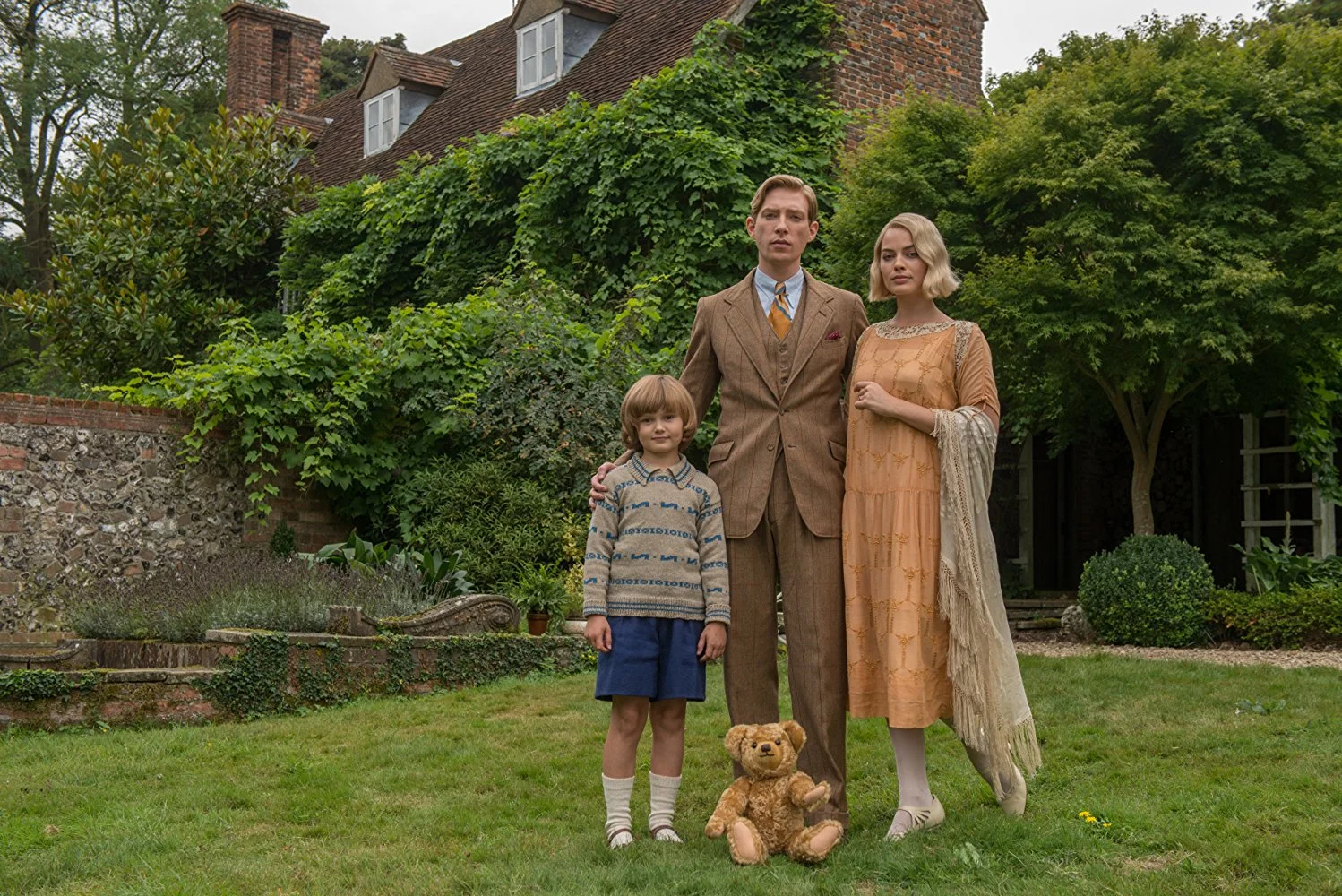 Goodbye Christopher Robin (2017) with Domhall Gleeson, Margot Robbie, and Will Tilston. (IMDB)