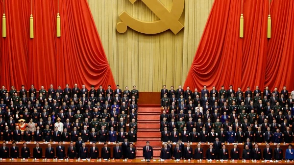 Xi Jinping stands before delegates at the closing session of the nineteenth National Congress of the Communist Party of China. (Thomas Peter/Reuters)