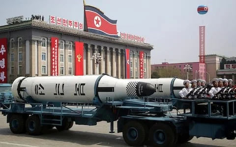 A submarine missile is paraded across Kim Il Sung Square during a military parade in Pyongyang, North Korea, in 2017. (AP Photo)