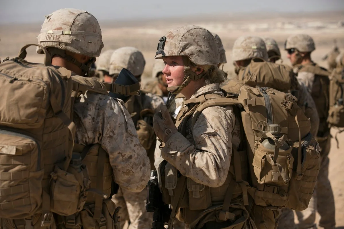 Lance Corporal Callahan Brown talks with a fellow Marine with the Ground Combat Element Integrated Task Force after an infantry assessment at Marine Corps Air Ground Combat Center Twentynine Palms in Twentynine Palms in 2015. (Mike Morones/Marine Corps Times)