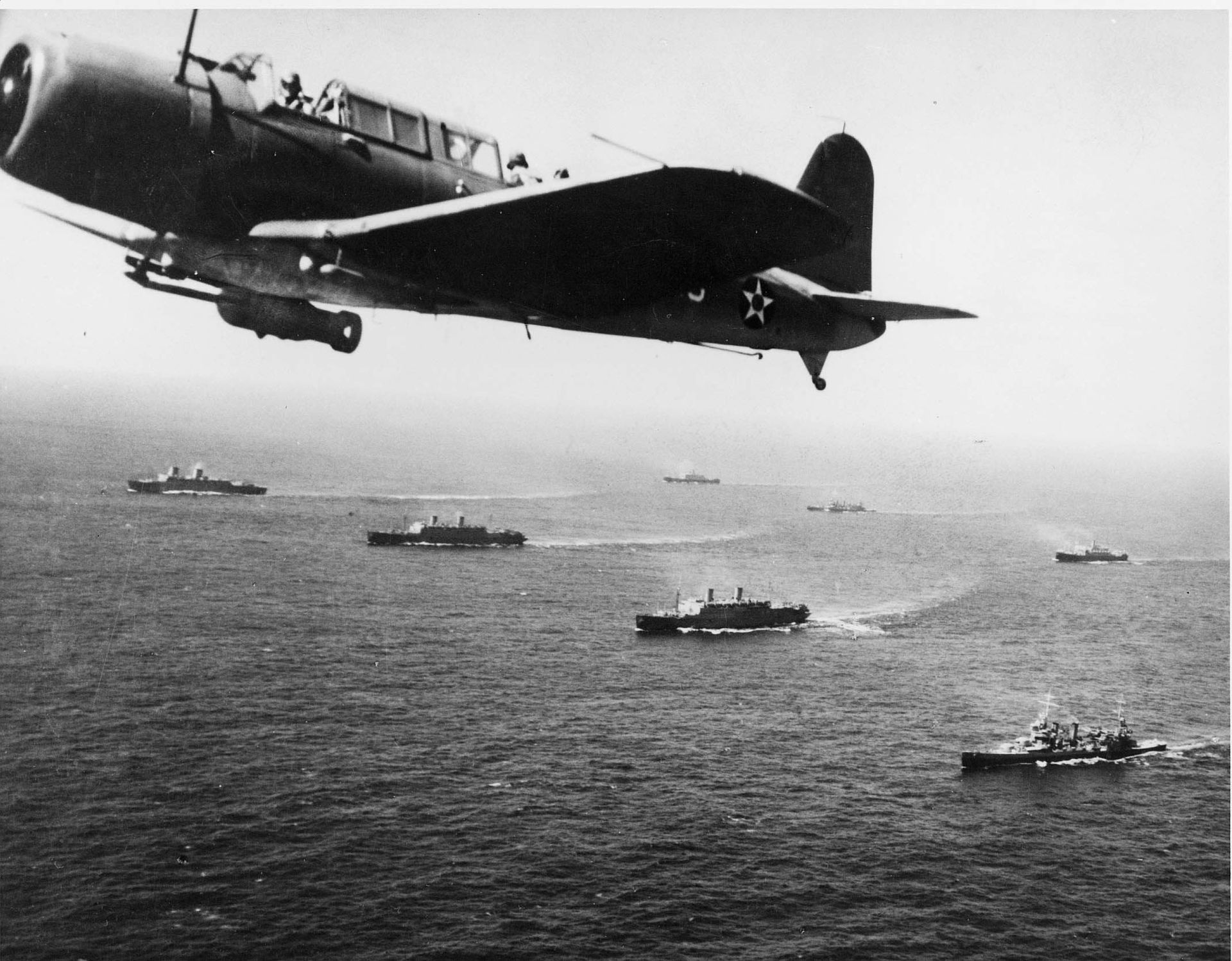A Vought SB2U Vindicator from the USS Ranger flies anti-submarine patrol over Convoy WS12 en route to Cape Town, 27 November 1941. (U.S. Navy Naval History Center/Wikimedia)