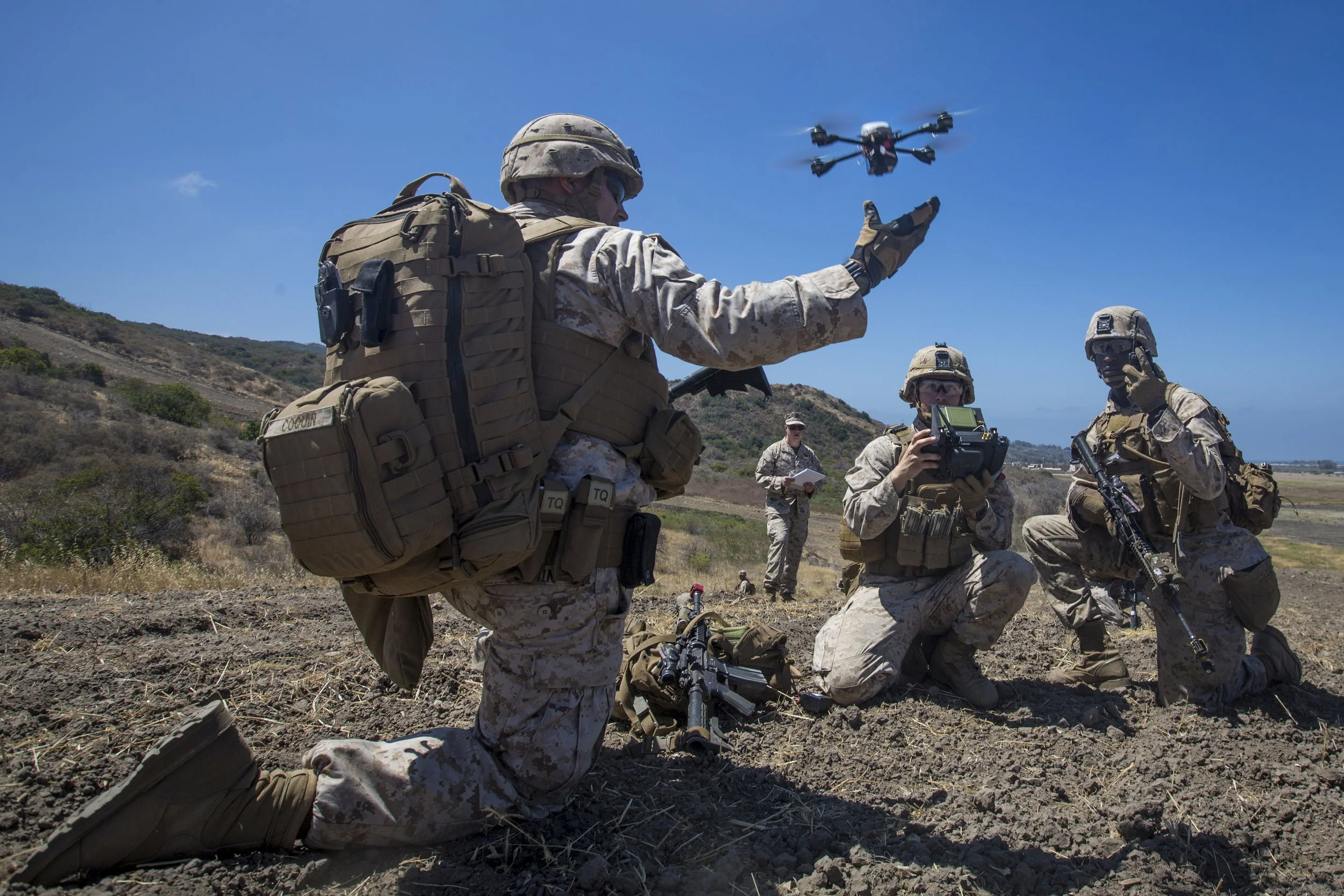 U.S. Marine Lance Cpl. Benjamin Cartwright launches the Instant Eye MK-2 Gen 3 unmanned aerial system during an exercise for Marine Corps Warfighting Laboratory’s Marine Air-Ground Task Force Integrated Experiment on Camp Pendleton. (USMC Photo)