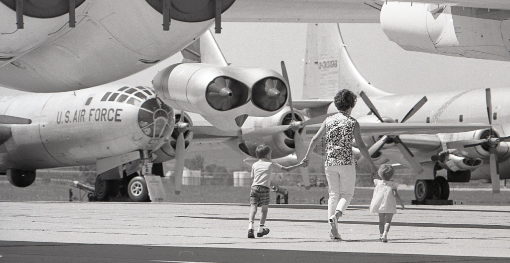 A family walking among SAC aircraft. (The Strategic Air Command and Aerospace Museum)