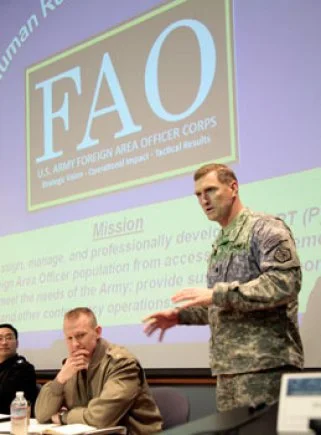 Lieutenant Colonel David Brigham explains the role of the Army Foreign Area Officer during the 4th Annual FAO Conference at the Naval Postgraduate School. (Javier Chagoya/U.S. Navy)