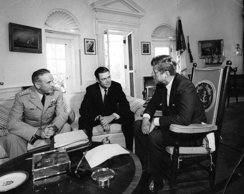 President John F. Kennedy meets with General Maxwell Taylor and Defense Secretary Robert McNamara in the Oval Office of the White House, February 10, 1963. (Getty Images)