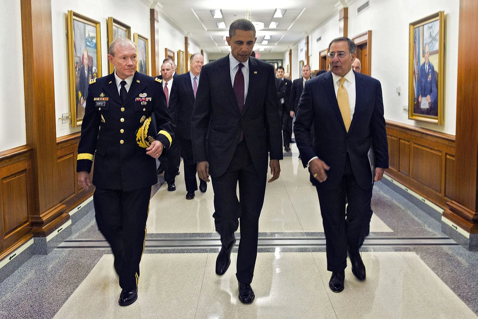 President Barack Obama walks with Defense Secretary Leon E. Panetta and Army General Martin E. Dempsey, Chairman of the Joint Chiefs of Staff, to a press briefing at the Pentagon, Jan. 5, 2012. (DOD Photo/Wikimedia)