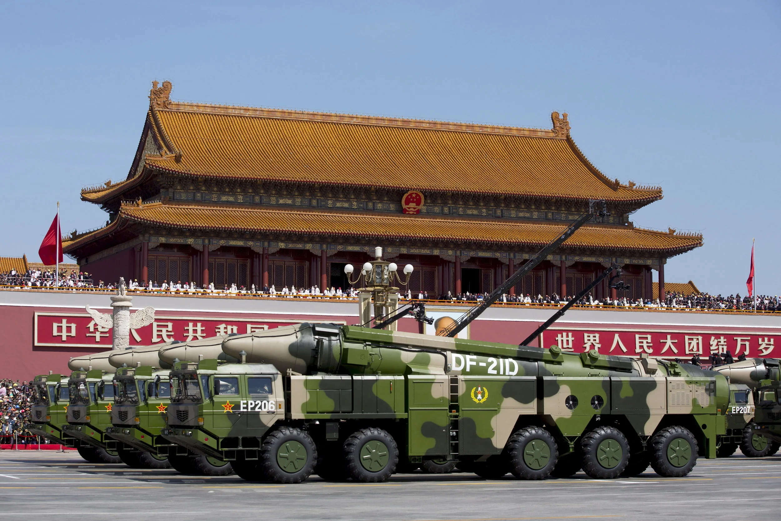 Chinese military vehicles carrying DF-21D anti-ship ballistic missiles, potentially capable of sinking a U.S. Nimitz-class aircraft carrier in a single strike, travel past Tiananmen Gate during a military parade to commemorate the 70th anniversary of the end of World War II in Beijing Thursday Sept. 3, 2015. (Andy Wong/Reuters)