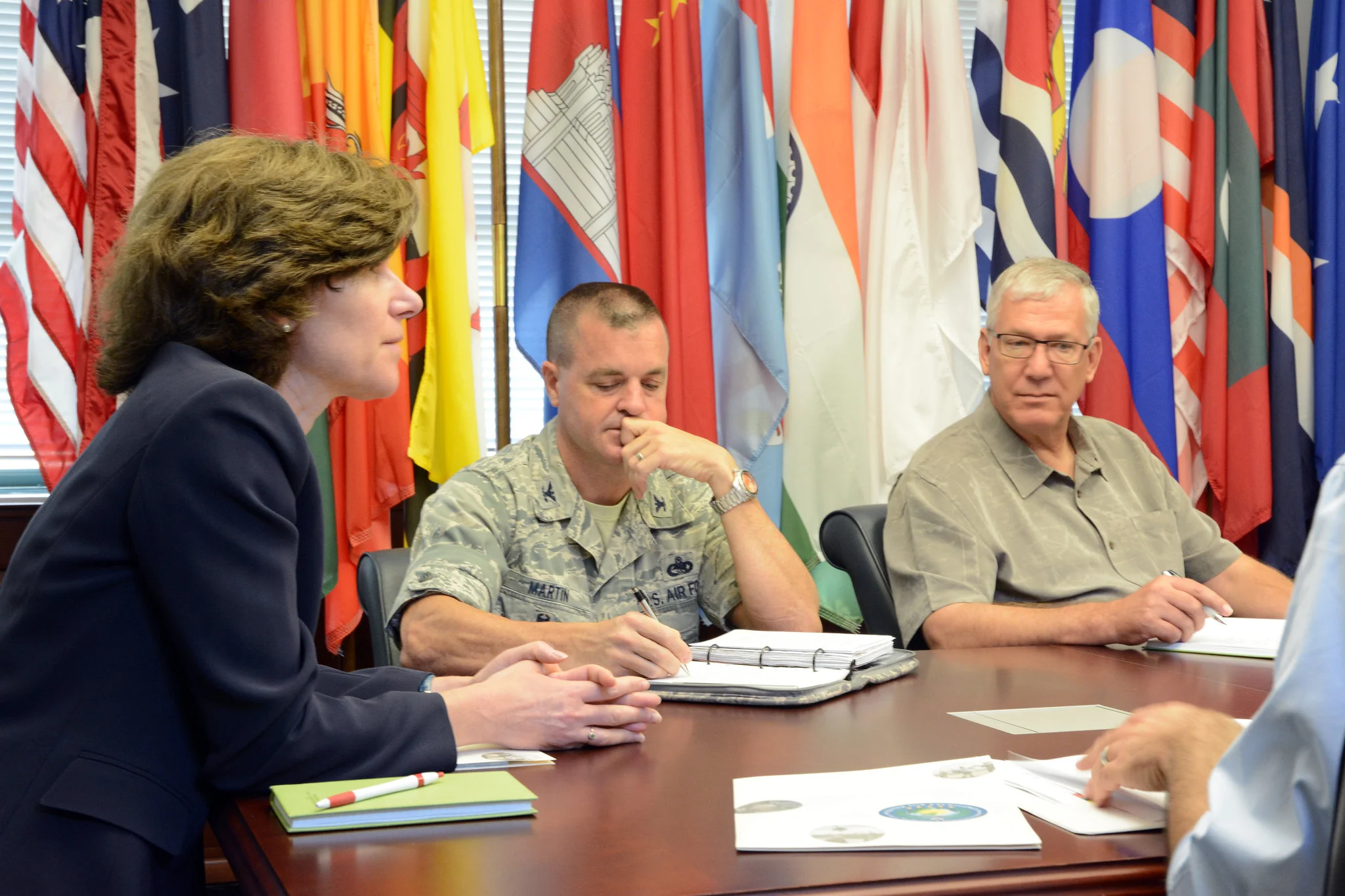 Deputy Assistant Secretary of Defense for Stability and Humanitarian Affairs Anne Witkowsky meets with Center for Excellence in Disaster Management and Humanitarian Assistance Director Col. Joseph Martin and Deputy Director Douglas Wallace at the organization’s headquarters in Pearl Harbor, Hawaii July 24, 2015. (US Government Photo)