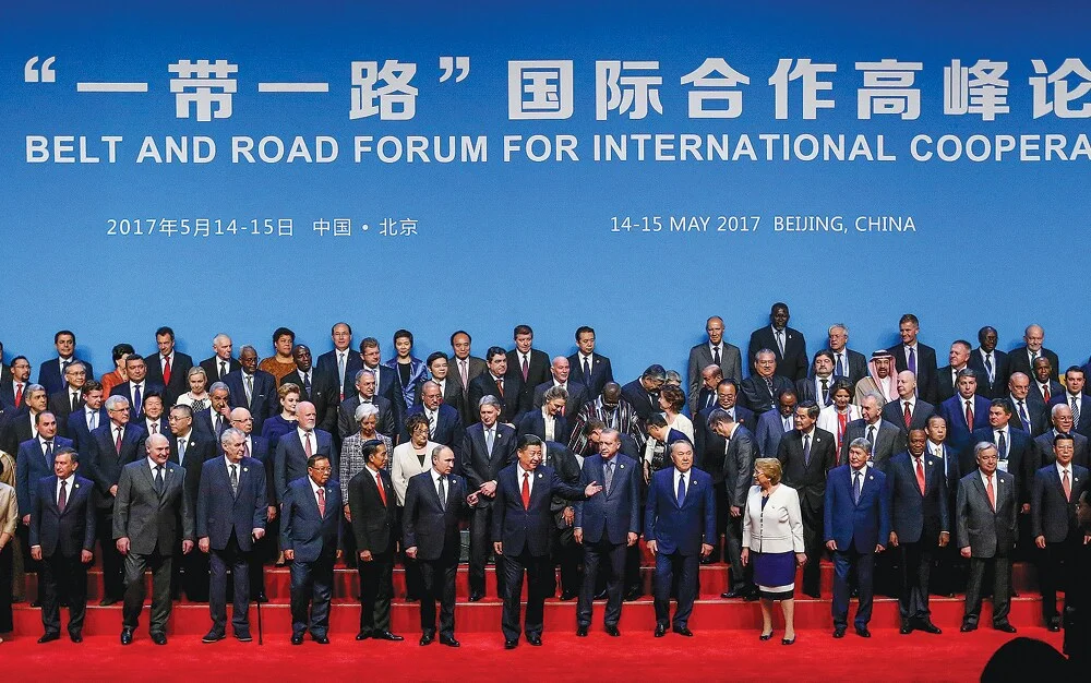 President Xi Jinping with other delegates and guests in a group photo at the opening session of the Belt and Road Forum for International Co-operation in Beijing (Xu JingXing/China Daily)