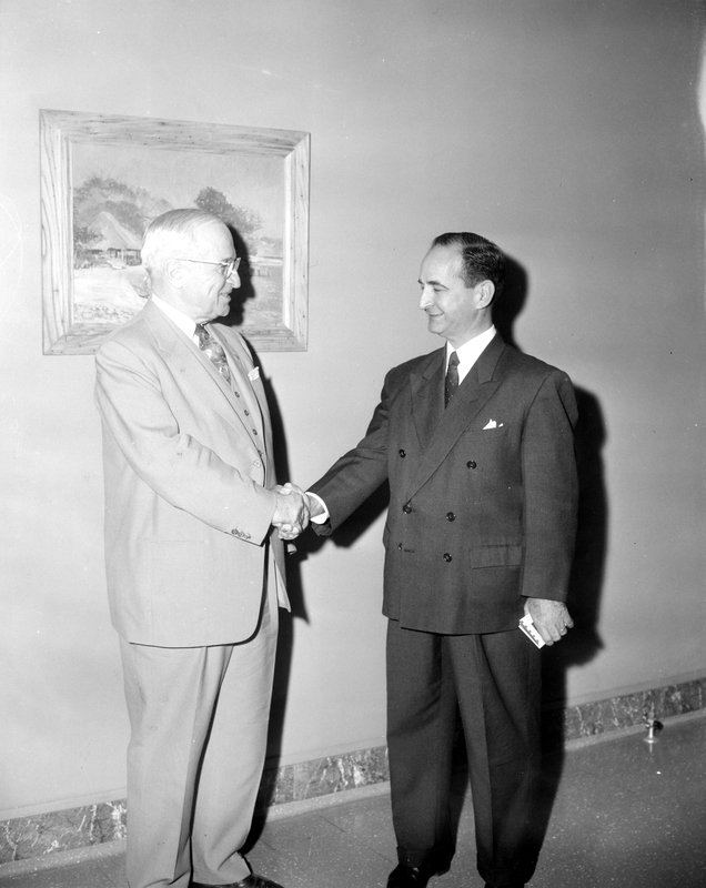   Former President Harry S. Truman and Jose Figueres Ferrer, former President of Costa Rica, shaking hands while at the Harry S. Truman Library in 1959. (Harry S. Truman Presidential Library)  