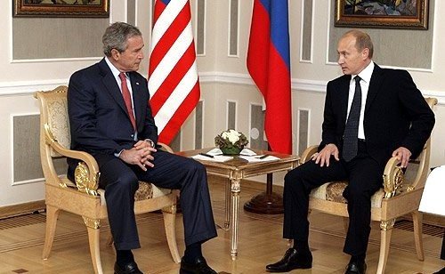 George W. Bush and Vladimir Putin meet in St. Petersburg, Russia, in 2006. (Kremlin)