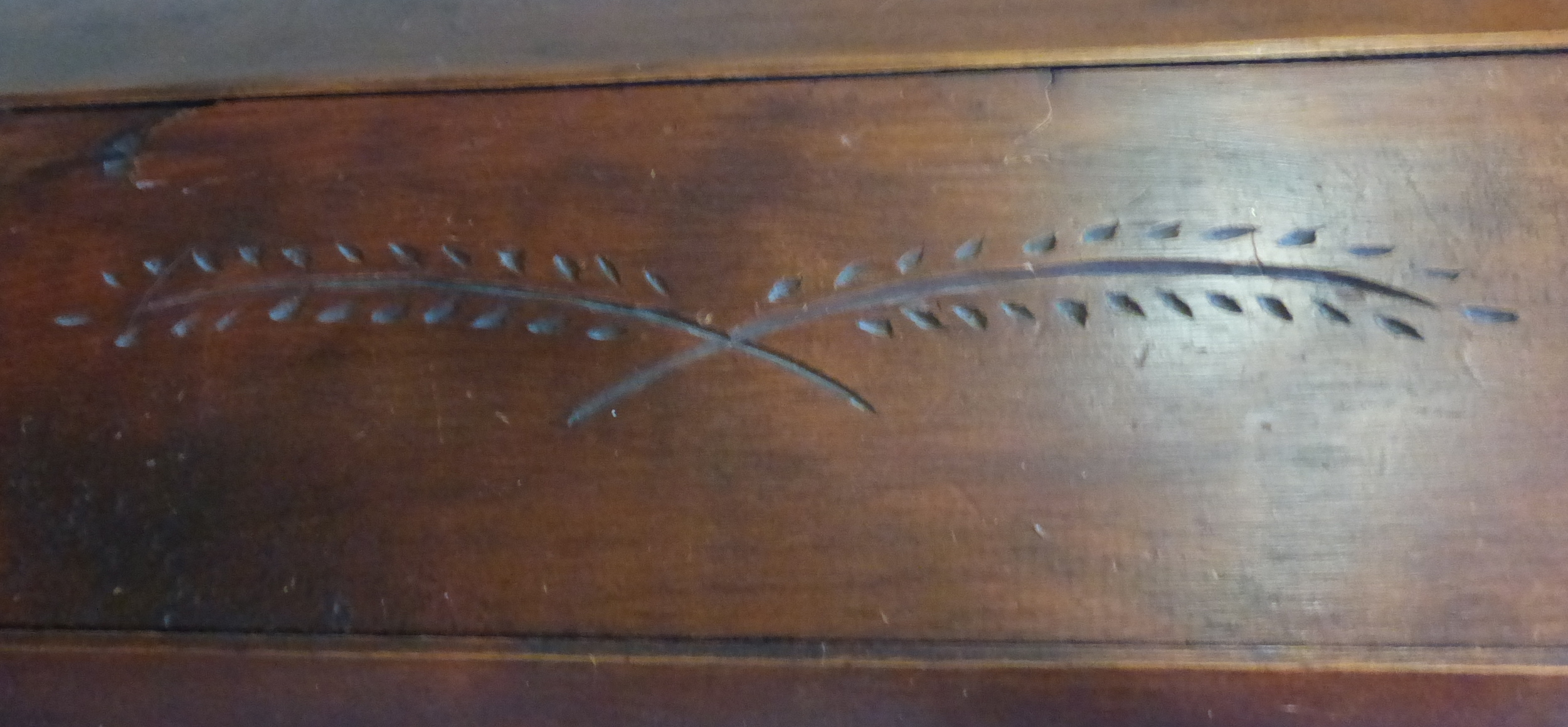 Carving on the top plank.