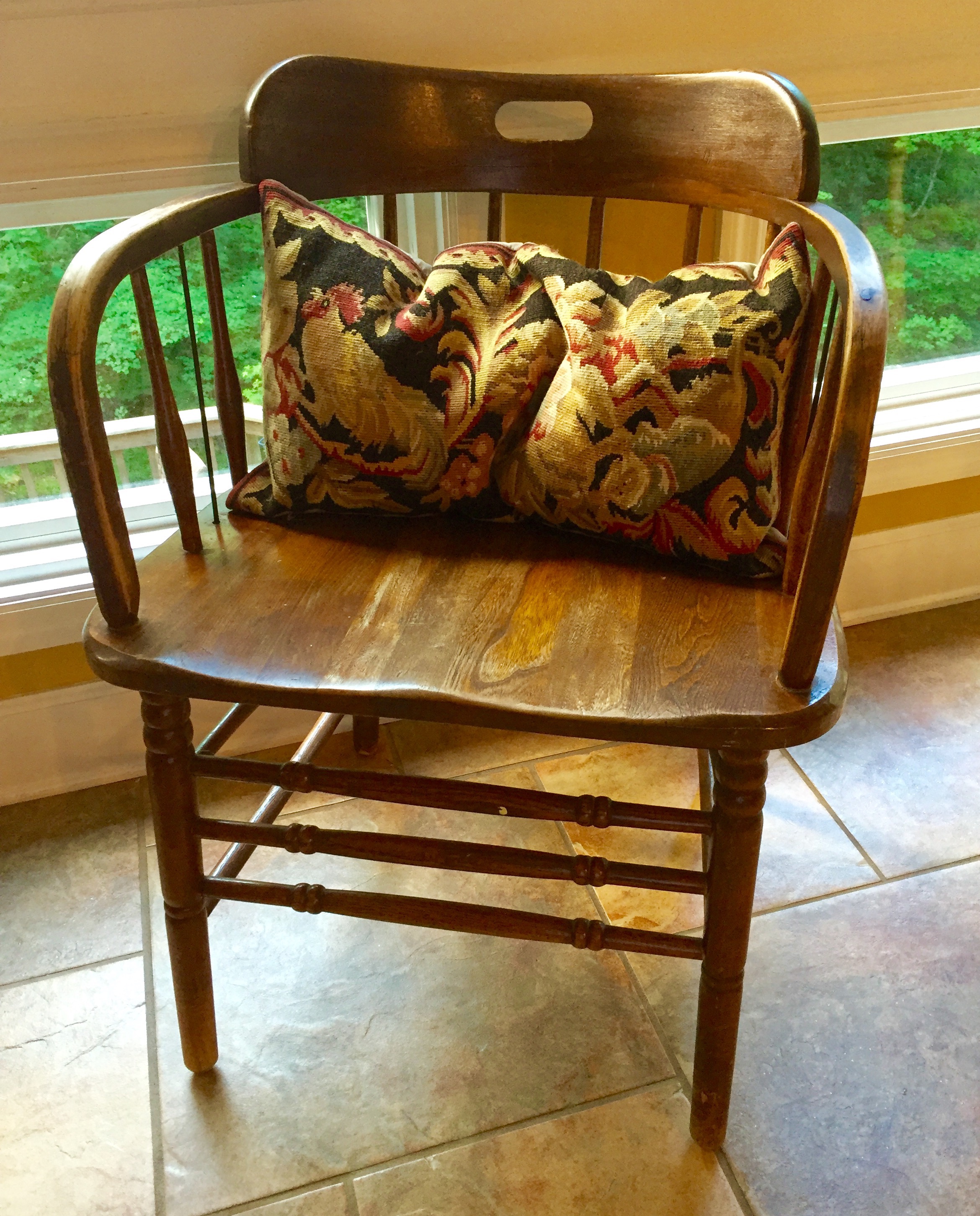My father's desk chair with worn arms. I have fond memories of visiting him in his home office and seeing him sitting in this simple captain's chair paying bills, writing letters and organizing his papers. My daughters were able to share similar memories and this story will live on.