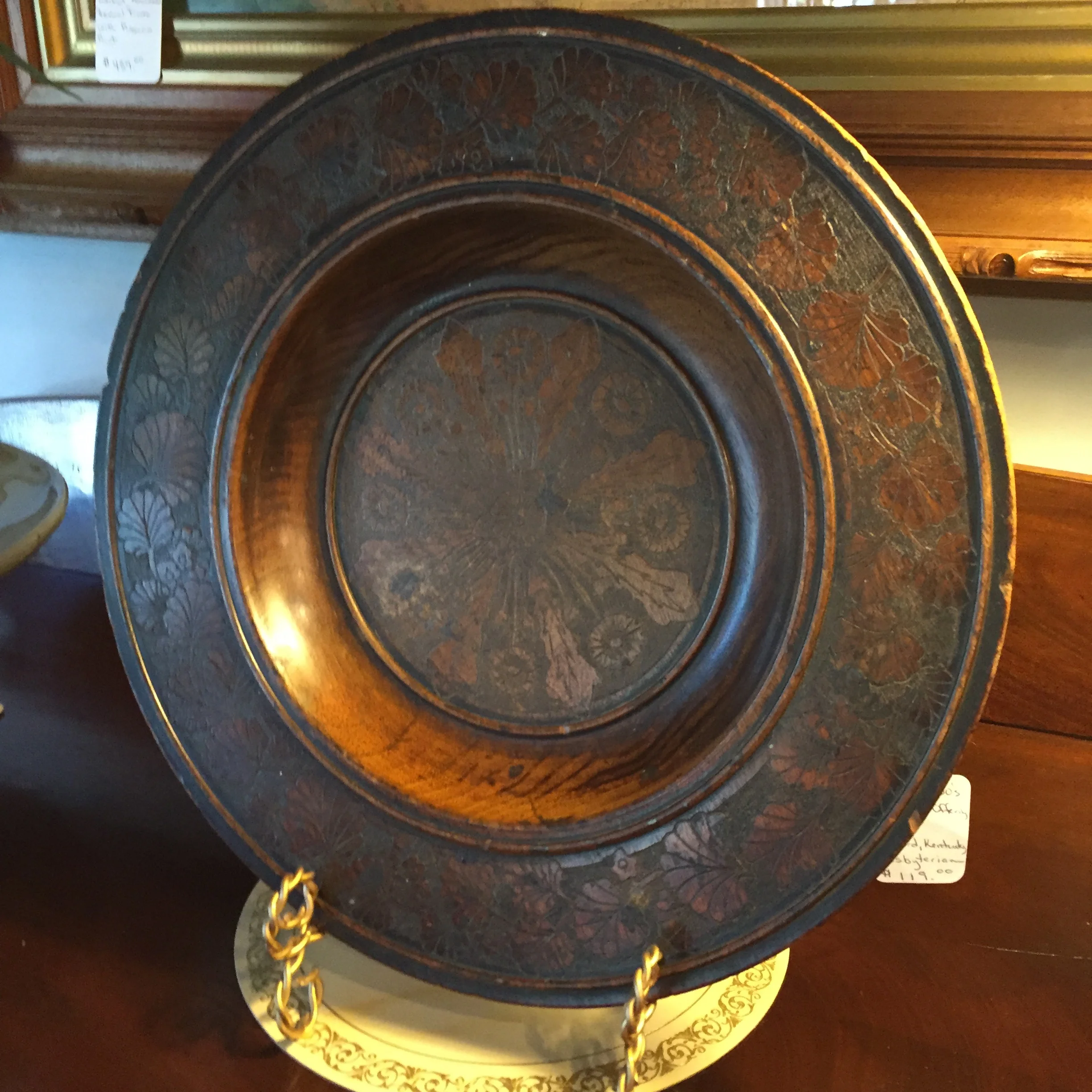 An 1800's wooden carved offering plate from a Kentucky Presbyterian church. This piece is in my fellow dealer's space at Southside Antiques in Chattanooga, TN and the moment I first saw it I was transported back to my early days of church. I can only image how many gifts were rendered here and how many hands passed this piece along a wooden pew. A southern cultural story that resonates with many.