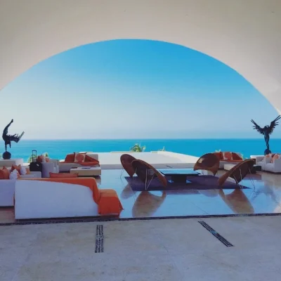 The open air lobby with soaring arches on either side provides an immediate view of the ocean upon arrival.