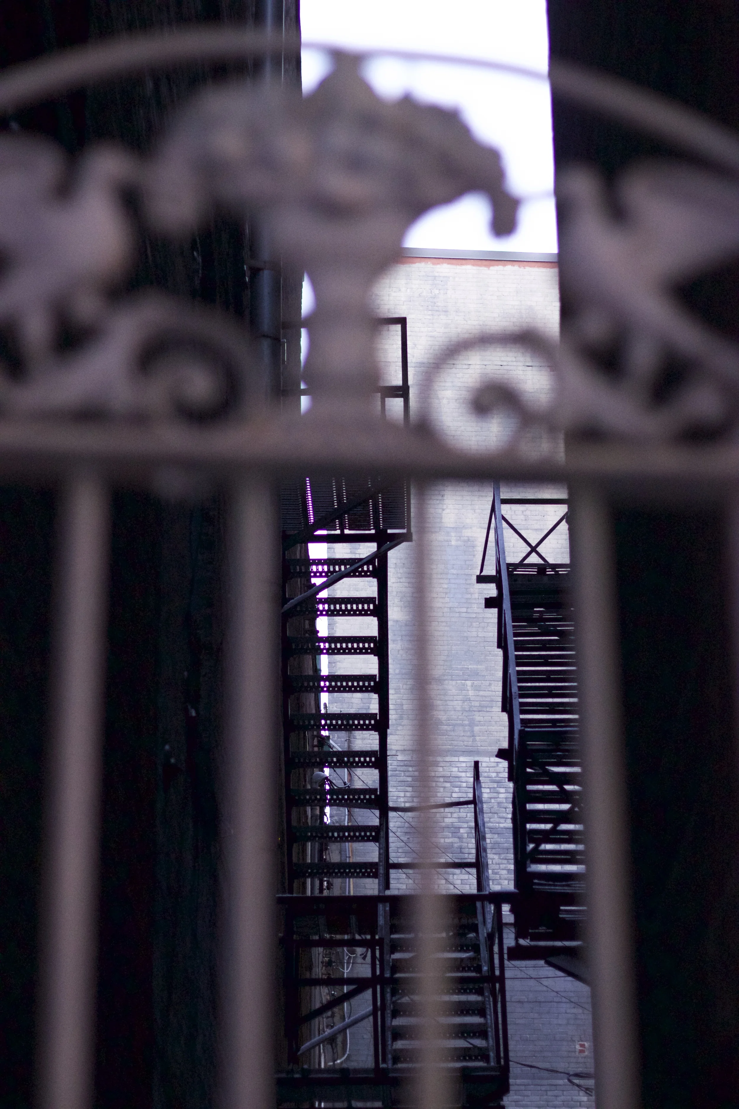 Staircase between two storefronts 