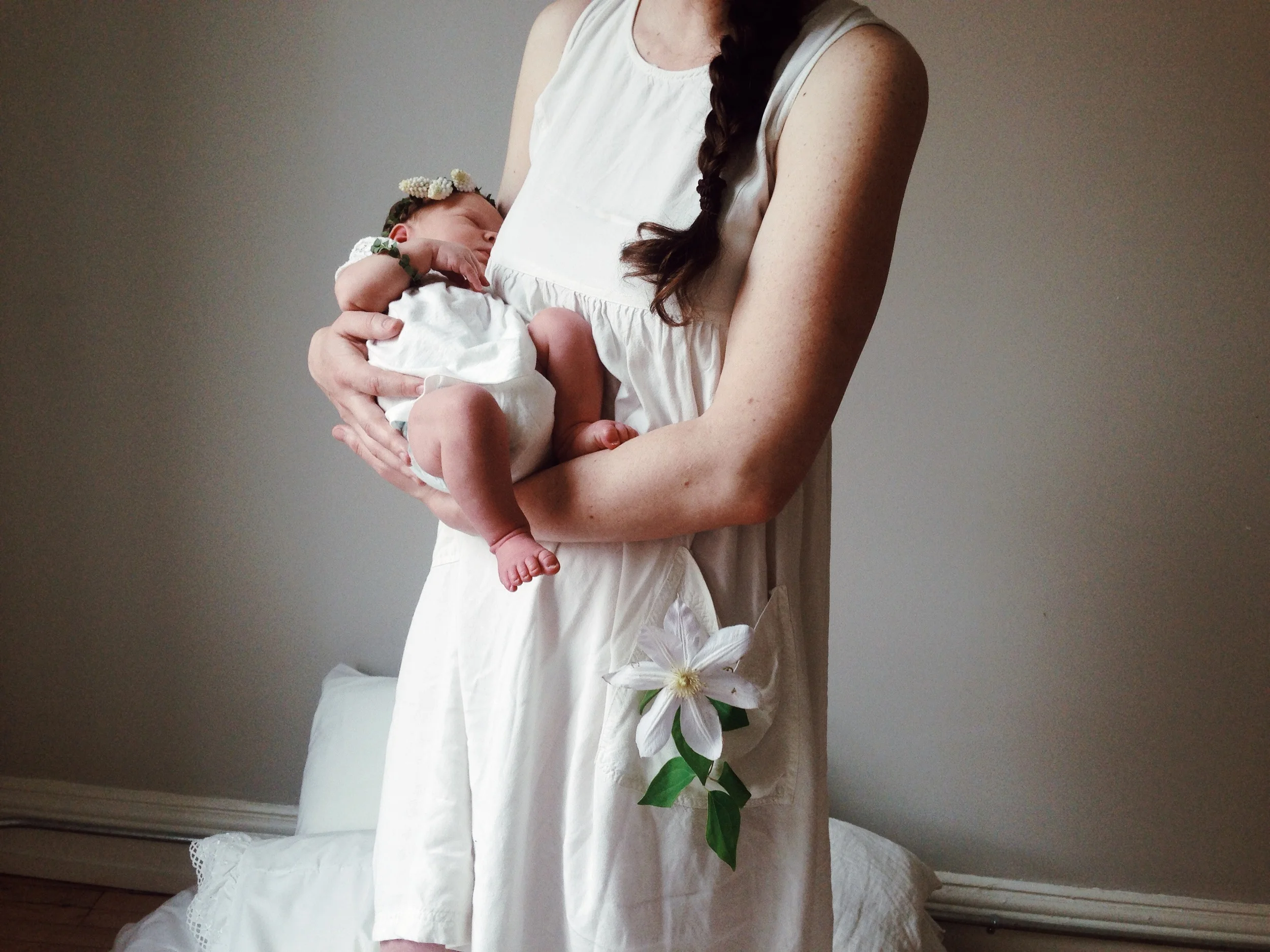a behind the scenes shot of a newborn shoot I did the floral styling for