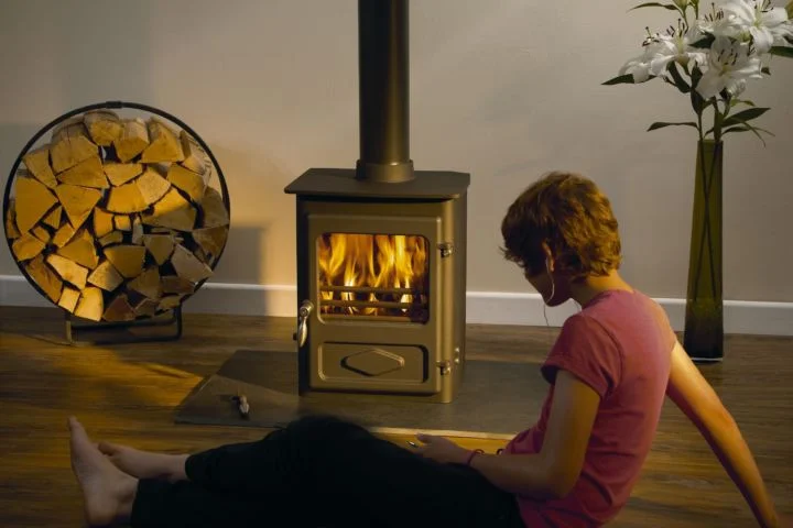 The Foxfire Range This little stove has a stunning 82% efficiency! The Foxfire not only benefits from the unique Woodwarm cleanburn air wash system, but also features new design details such as the standless steel handle.