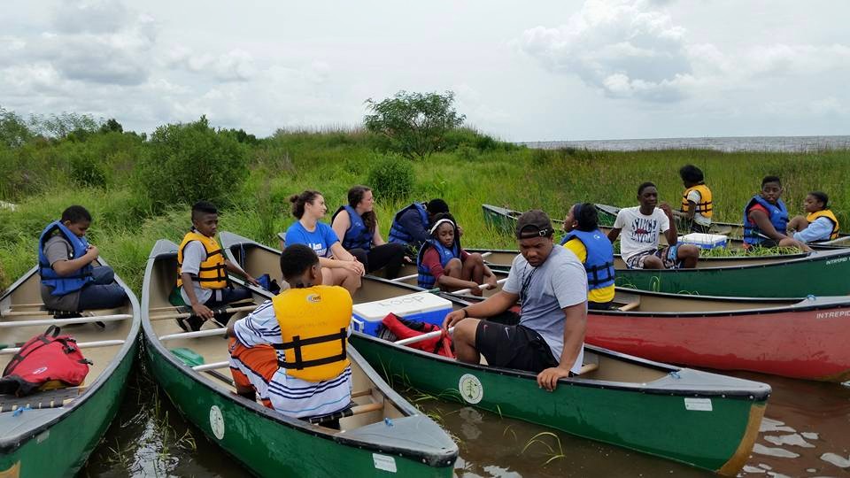 DT Aaron sixth graders take a breather after arriving at Lake Pontchartrain. 