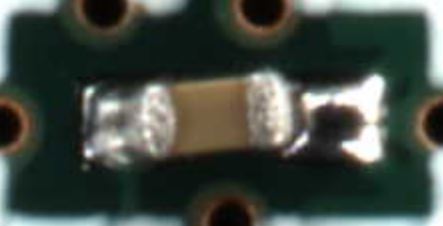 This is what a "Head-In-Pillow" defect looks like. Notice how the right side isn't actually wetted to the component.