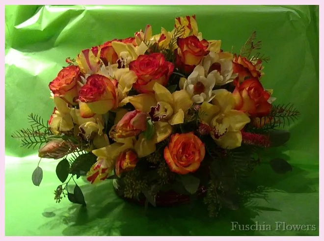 circus roses, golden cymbid orchids, parrot tulips and leucadendron.jpg