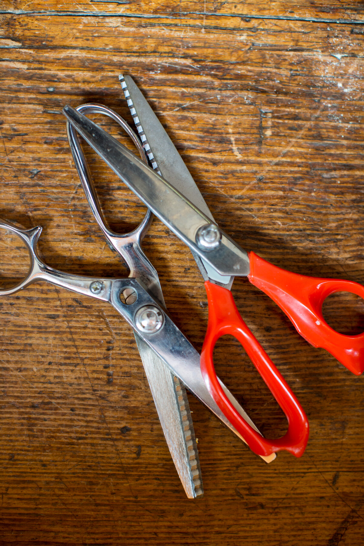 With pinking shears, cut the fabric