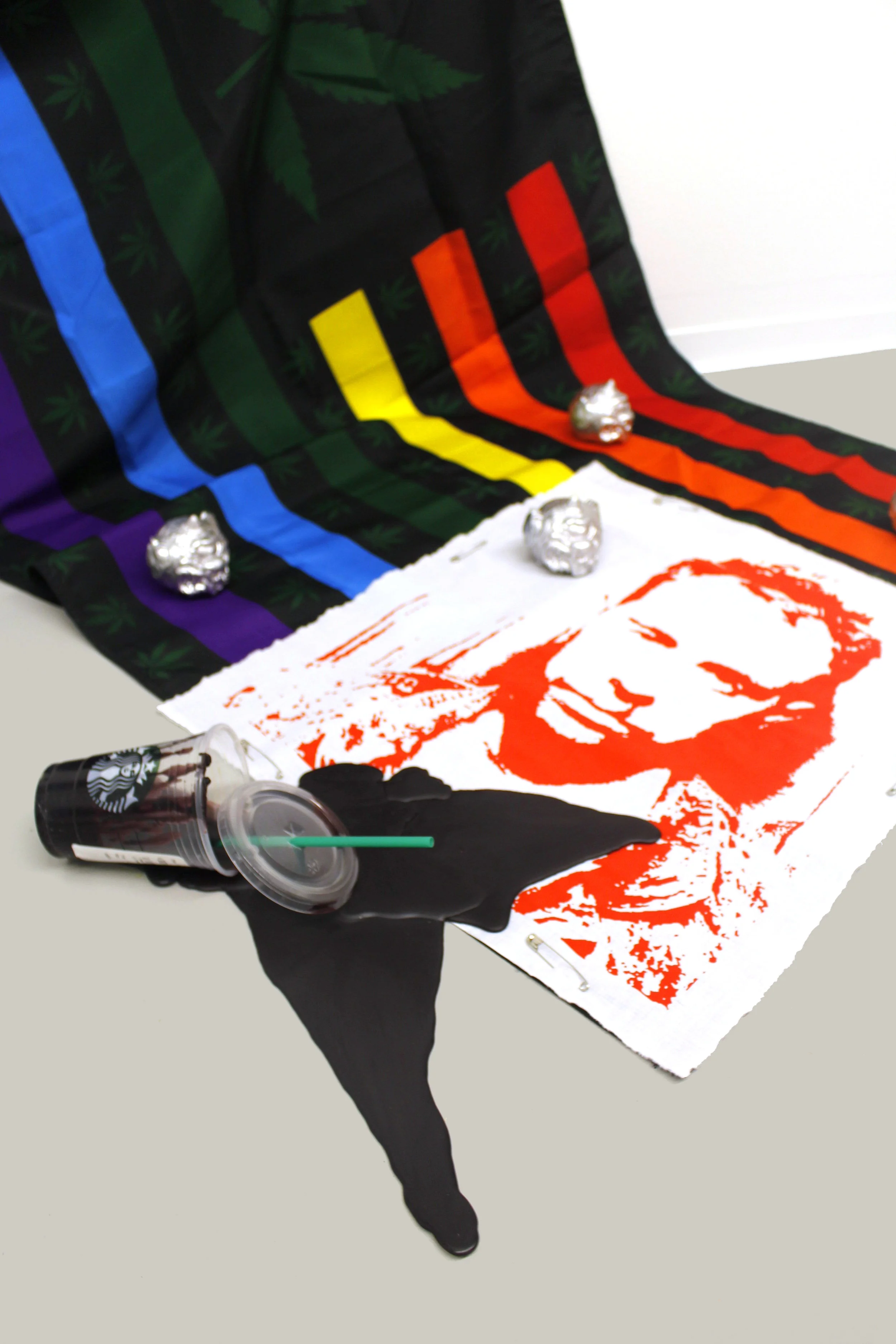 Publicity Stunt Wax, acrylic on cotton, enamel, Starbucks™ cup, flag Various dimensions
