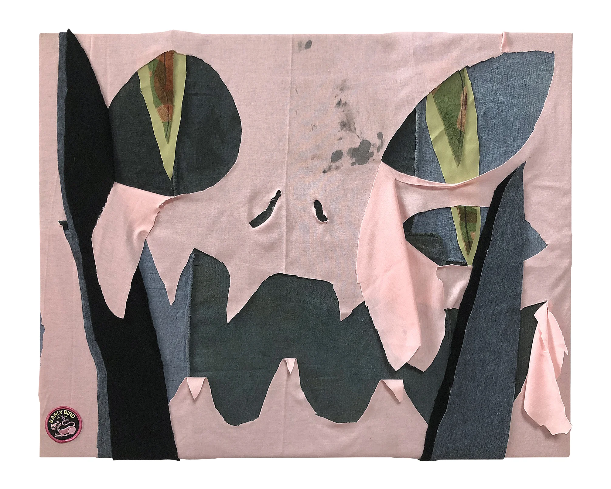 The Cutting Mask Jersey, fleece, silkscreened faux fur, and tarnished studio rags on canvas with patch 30” x 22”