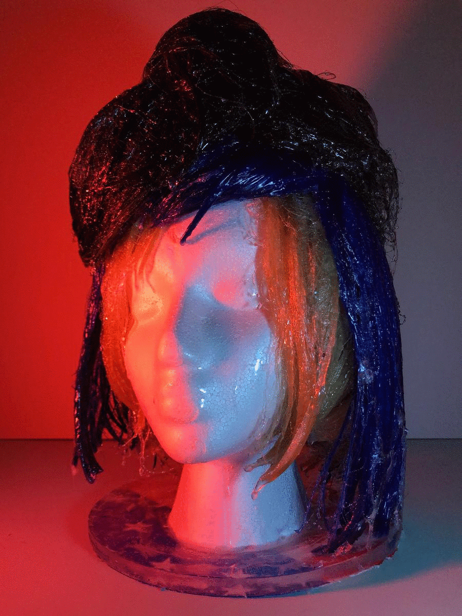 Miss Teen USA Resin, styrofoam head, found wigs, plastic banners 8” x 10” x 18”