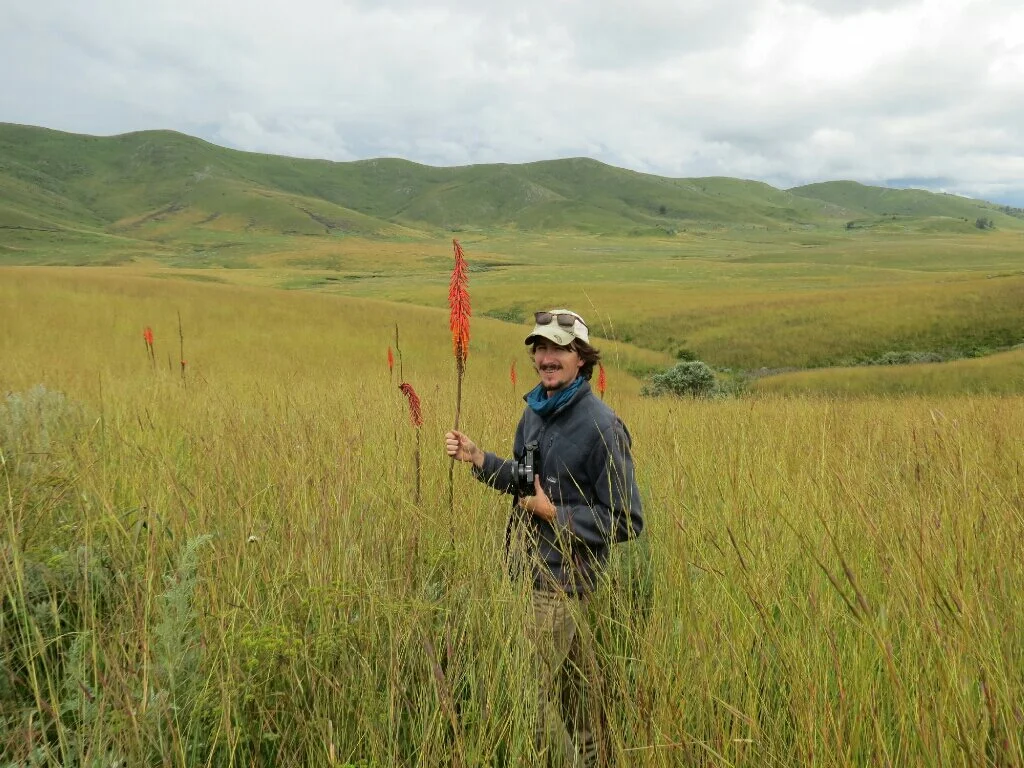 Kiki and an Kniphofia at Kitulo. 