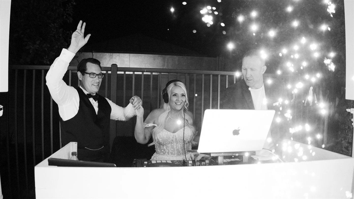 One thing we love doing at weddings? Getting the bride &amp; groom behind the DJ booth.

It instantly turns the energy all the way up. The crowd goes crazy, the couple feels like the stars of the show, and it creates some of the most iconic photos an