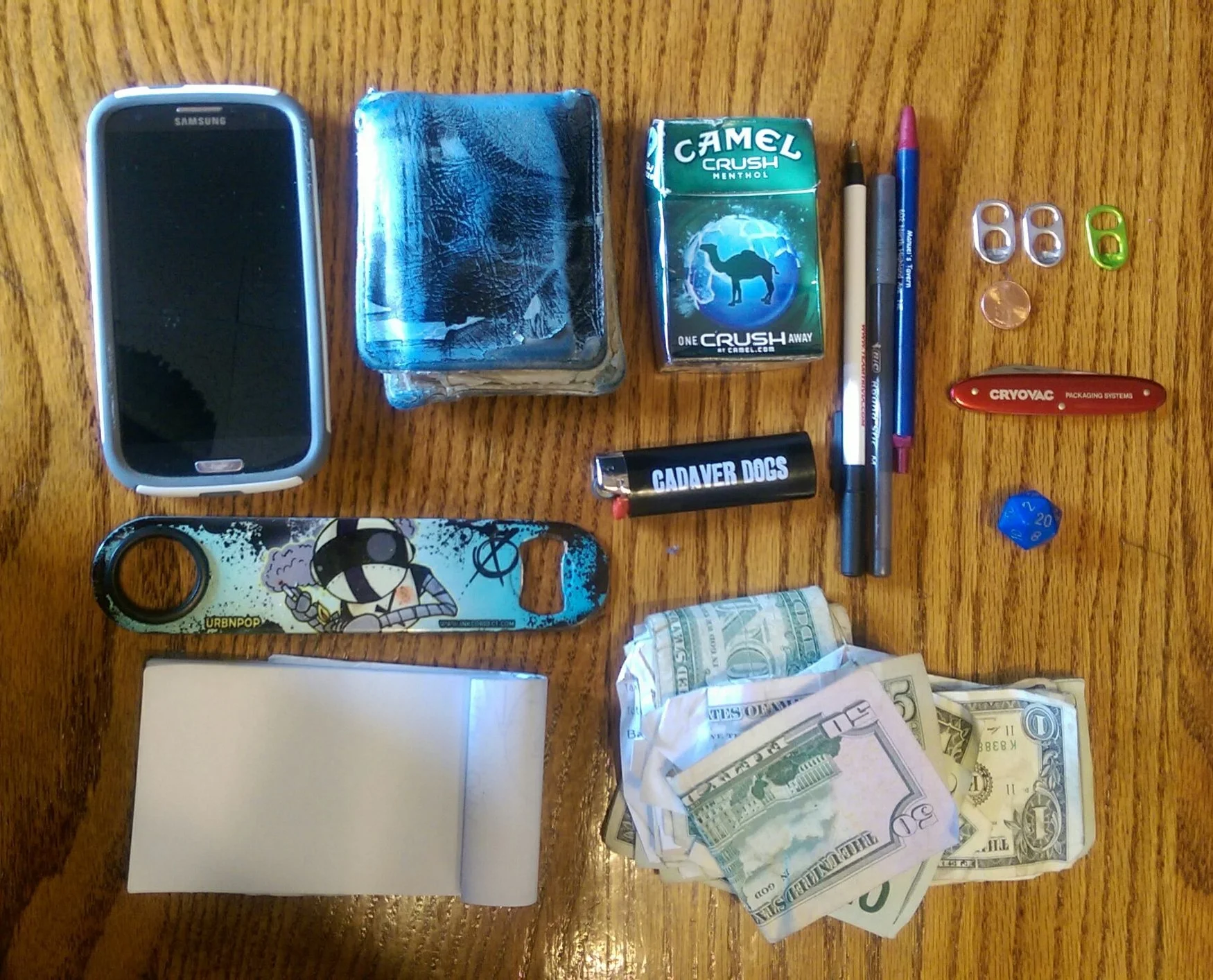 "I carry around that 20-sided die with me because the first time I rolled it, I ended up rolling a twenty.It helped me win that&nbsp;game I was playing and now it's my lucky die. I’ve had the&nbsp;wallet for over 15 years. Bought it at a Renaissance…