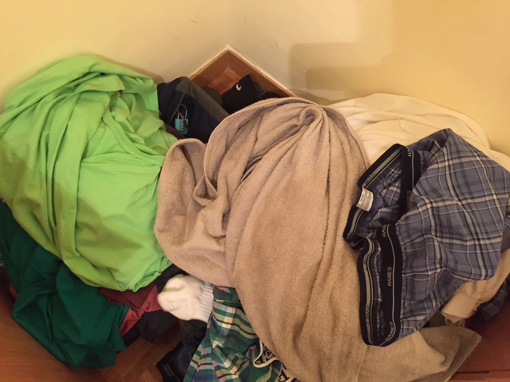 My current pile. It's actually not that bad, kind of. I even pre-separated the whites and colors! If you have a problem looking at my dirty underwear, kindly leave. Photo by Max Siskind