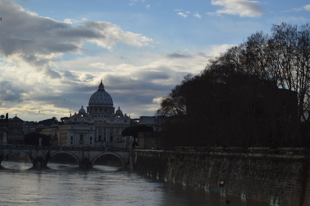   Zoomed in view of St. Peter's Basilica from across the Tiber. Photo by Max Siskind.  