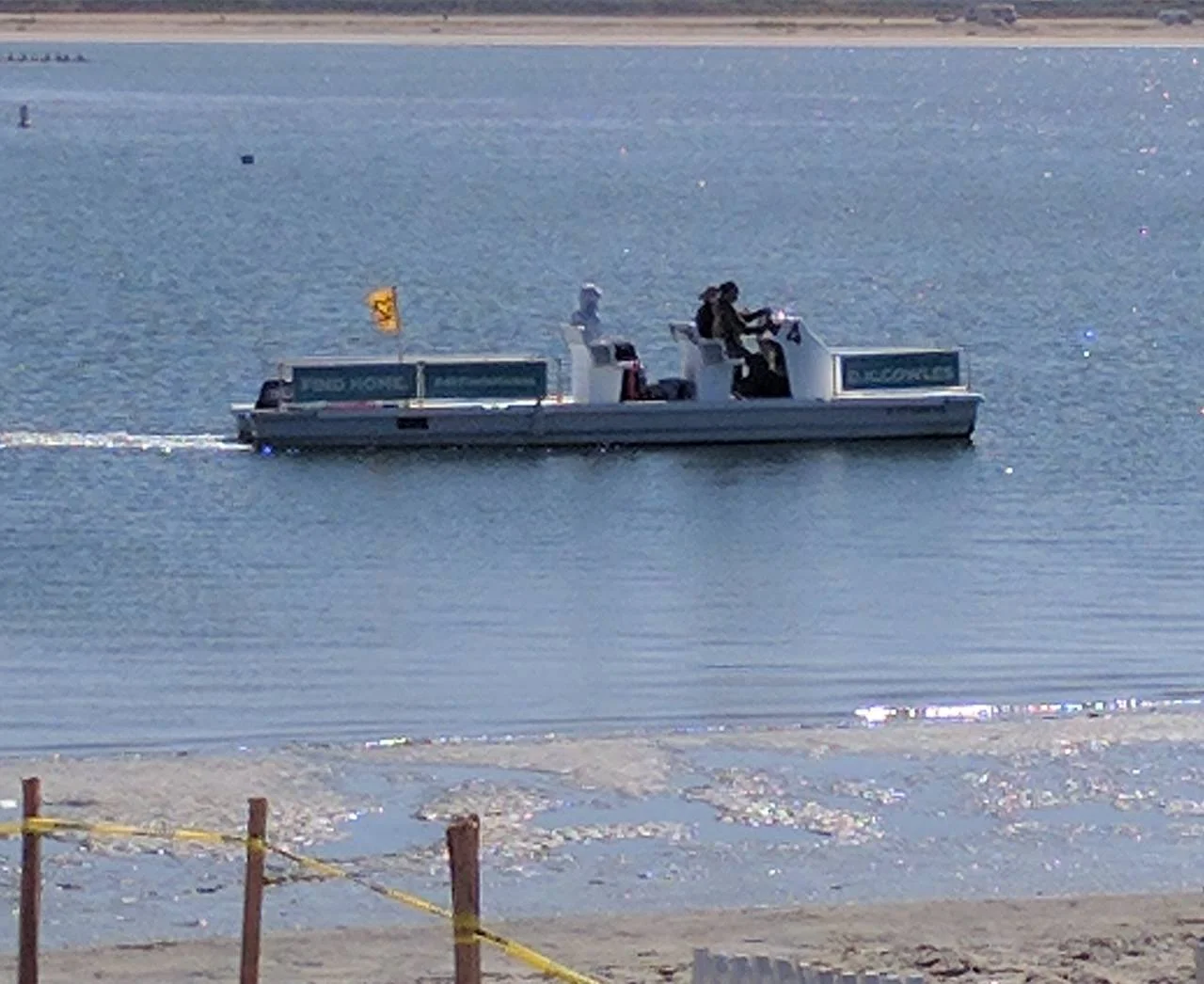 There has been a sighting...my client Amy Michaud who is also a rowing referee and rowing coxswain par excellance...just sent me this photo from the finish line at the San Diego Crew Classic. She said "this launch keeps passing me refereeing at the finish line"...Homes by DK Cowles is PROUD TO SUPPORT NEWPORT AQUATIC CENTER!