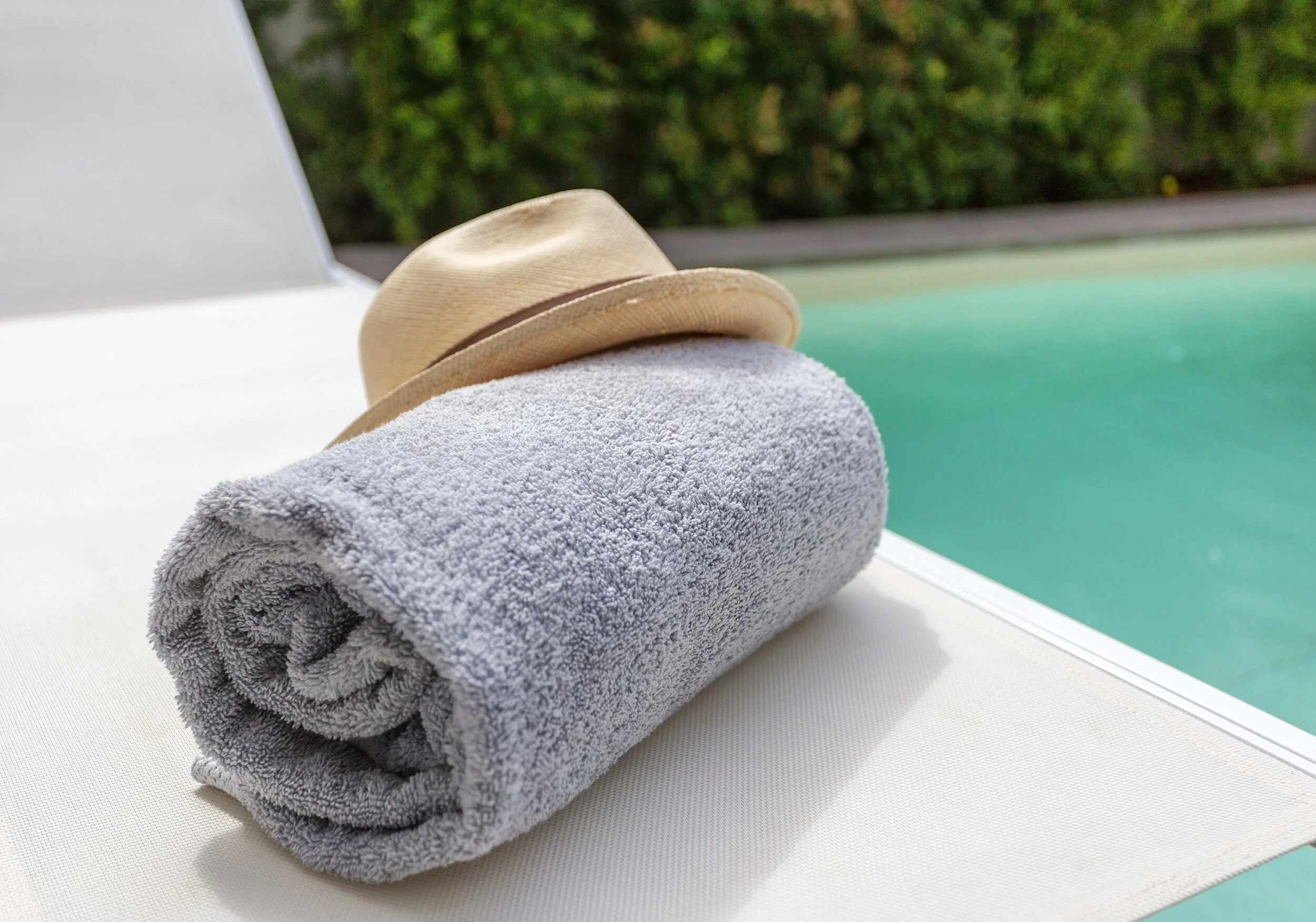 The Best Ways to Incorporate Towel Storage Into Your Pool Design
