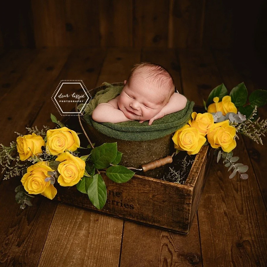 Traditionally, yellow roses symbolize joy, sunshine and new beginnings. For this precious family, they also symbolize a deep connection to family so it was extra special to incorporate them in their maternity and newborn sessions!

#babyphotography #