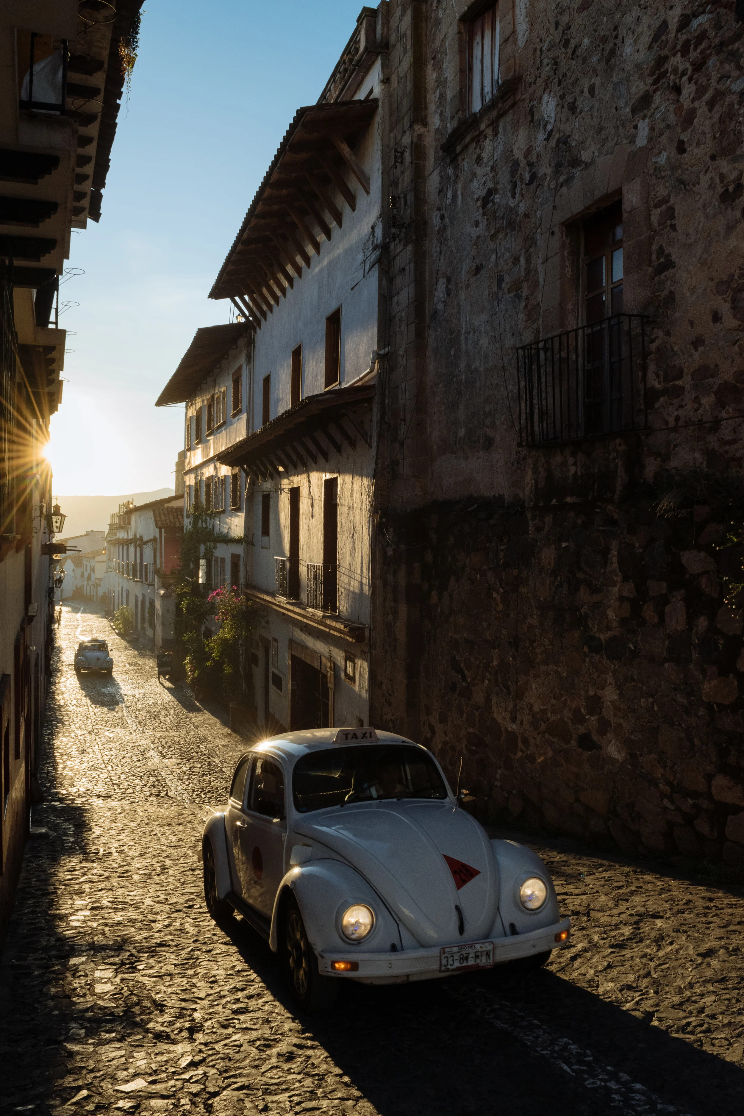 Taxco white VW Beetle taxi