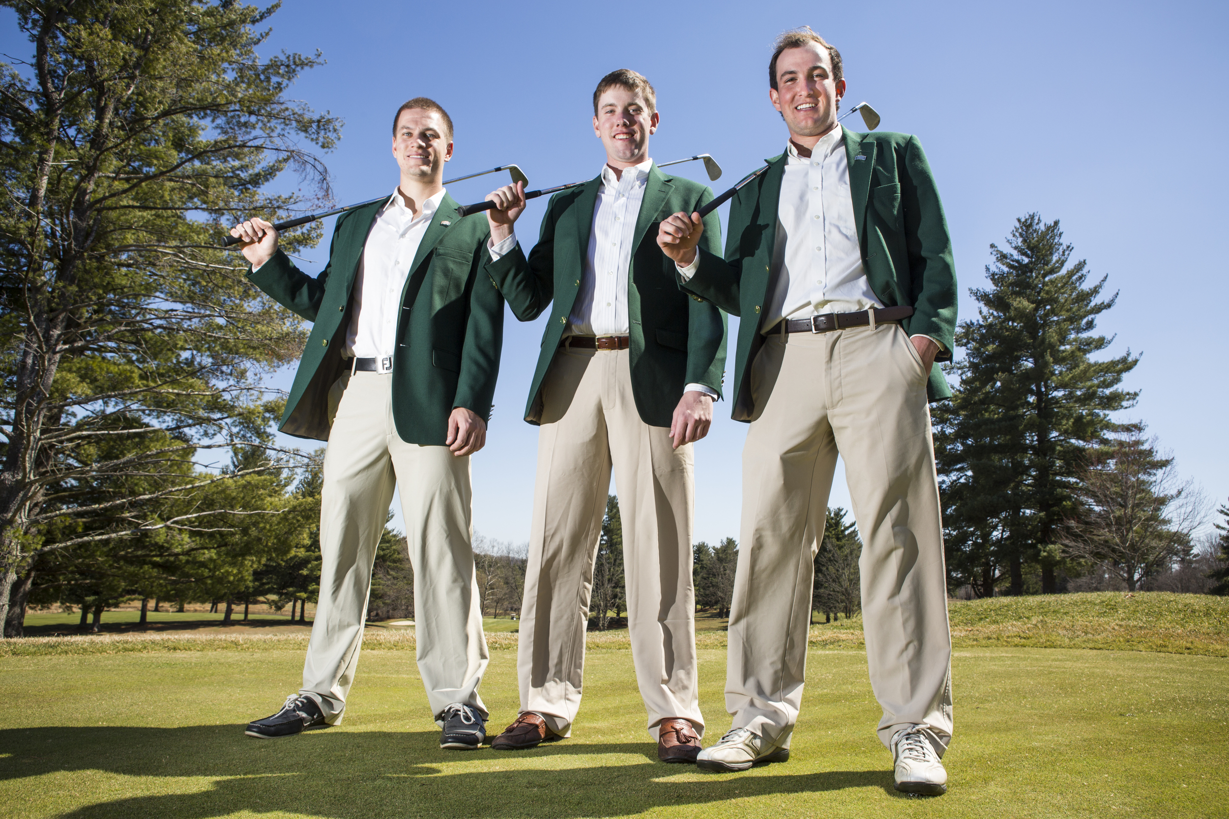  (from left to right) Will Stines, Thomas Leech and Andrew Mlynarski, all seniors on the Ohio University men's golf team, pose for a portrait at the Athens Country Club in Athens, Ohio, on April 1, 2015. 