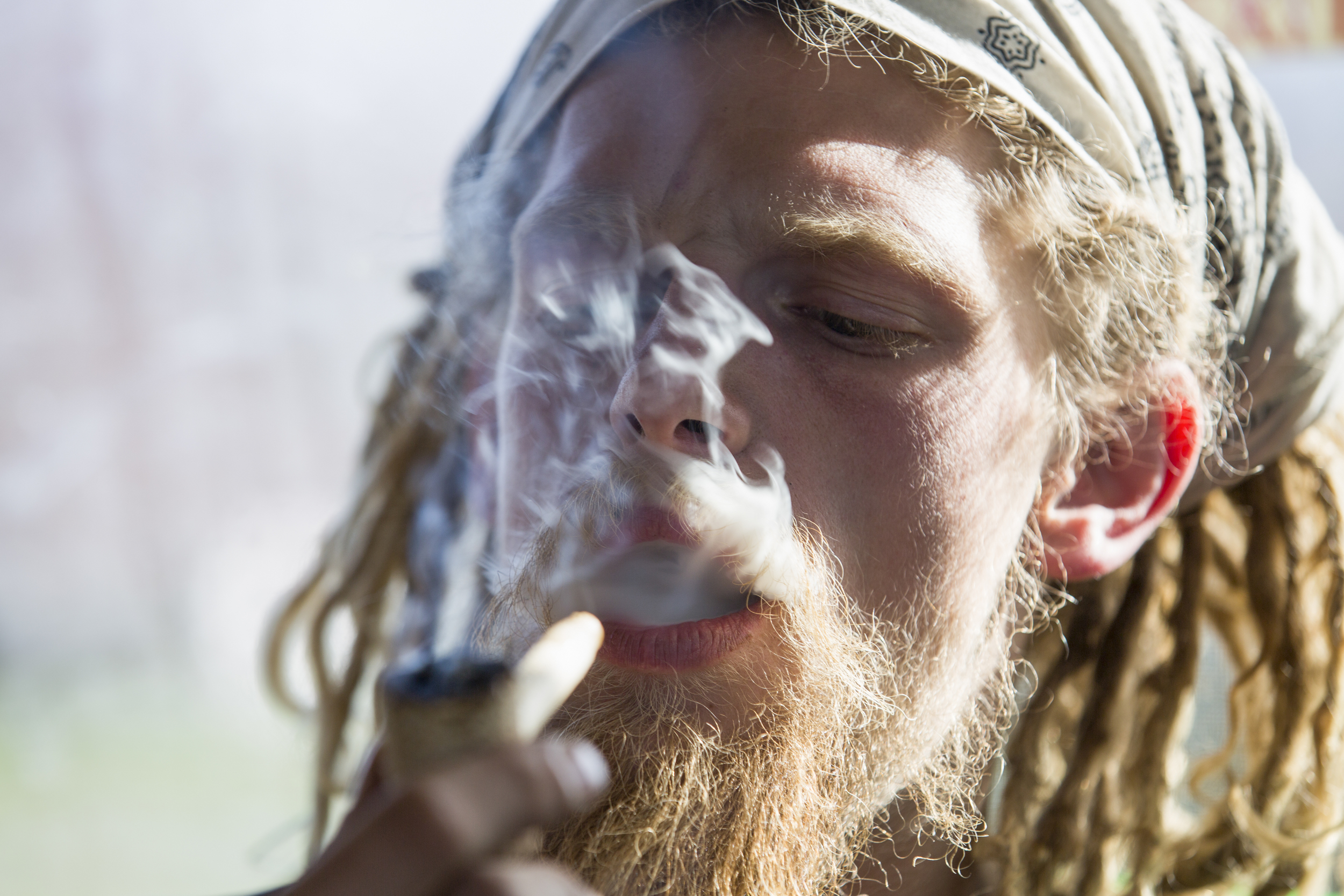  Solar smokes tobacco out of a pipe while travling toward Indianapolis, Indiana. 